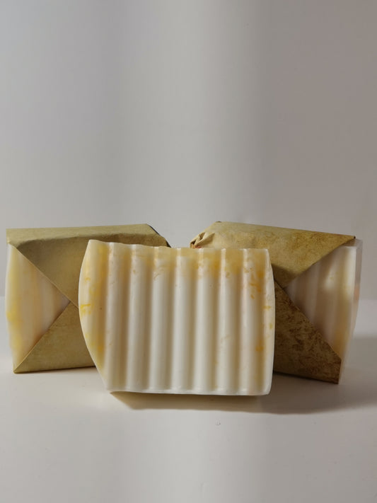 orange, patchouli, and cinnamon goat's milk soap